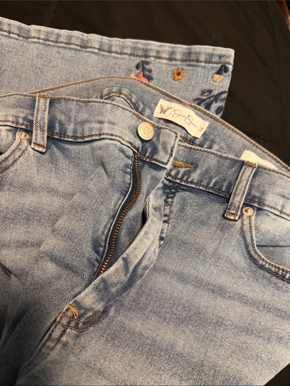 Jessica Simpson Daisy Flare Light Blue High-Rise Jeans with Embroidered detail.